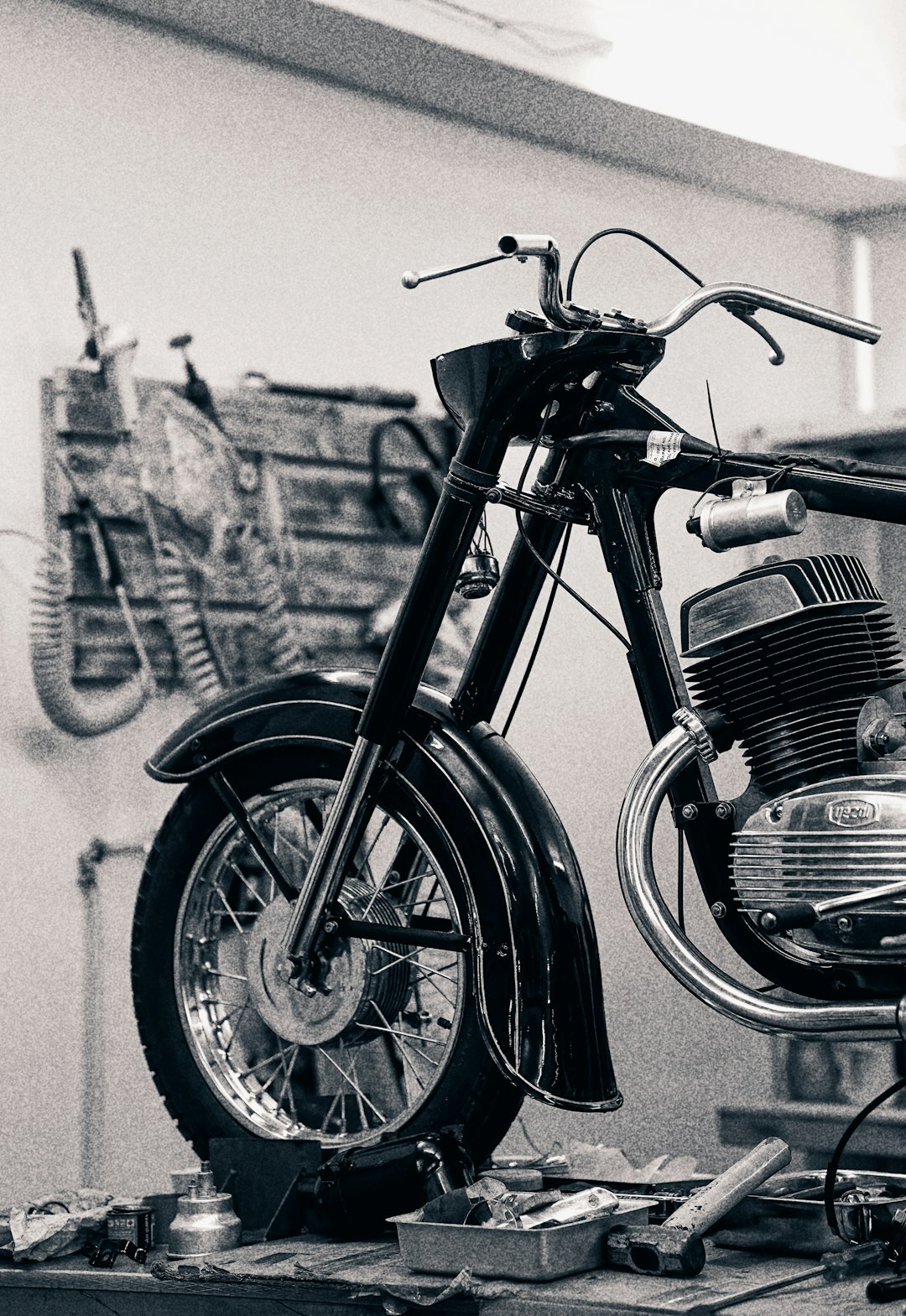 A classic motorcycle being restored.